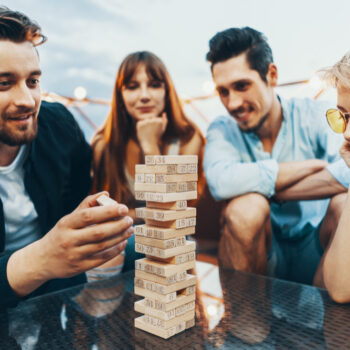 company-young-people-playing-board-game